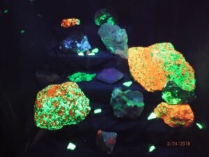 Glowing rocks under ultraviolet light display.