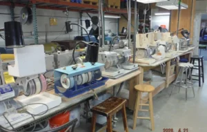 Workshop with multiple grinding and polishing machines.